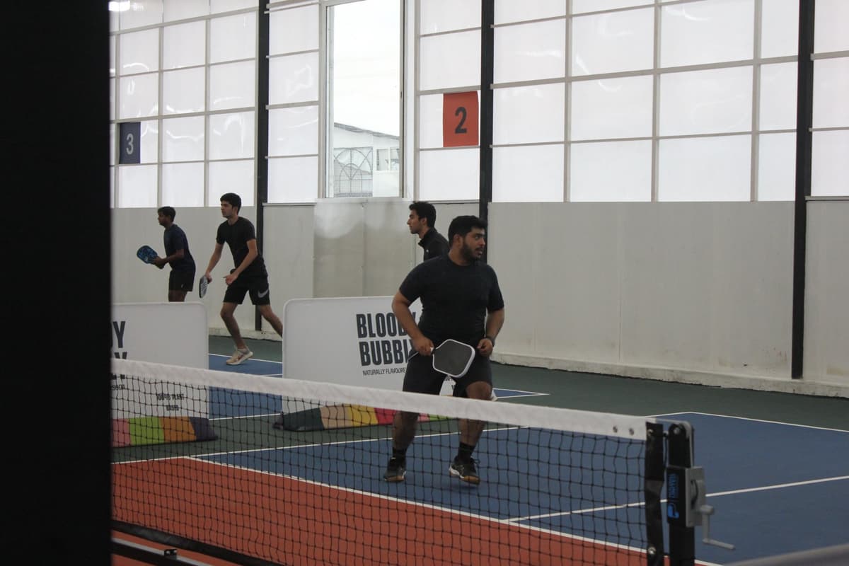 Doubles Match at the Net